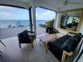 Superbe F3 meublé avec terrasse, deck et magnifique vue mer