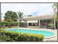 A VENDRE A KOUROU (97310) UNE MAGNIFIQUE MAISON EN BOIS T5 d